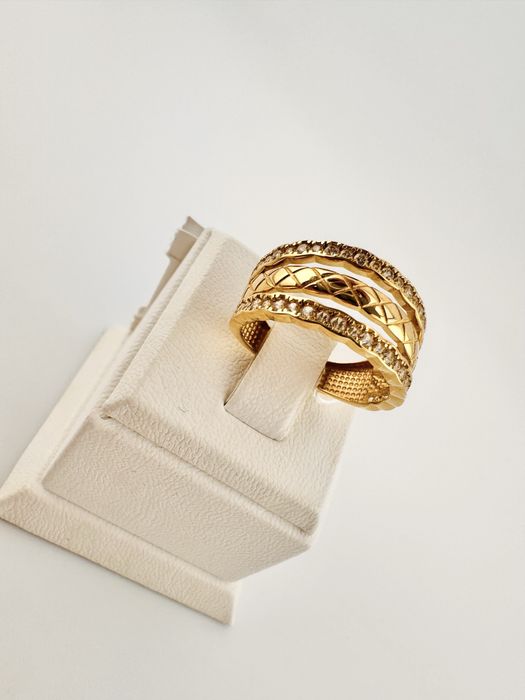 Золоті каблучки нові