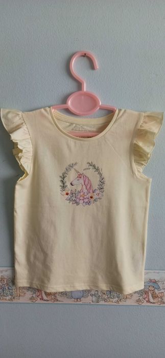 Children's T-shirt featuring a unicorn. Brand new and hand-printed.