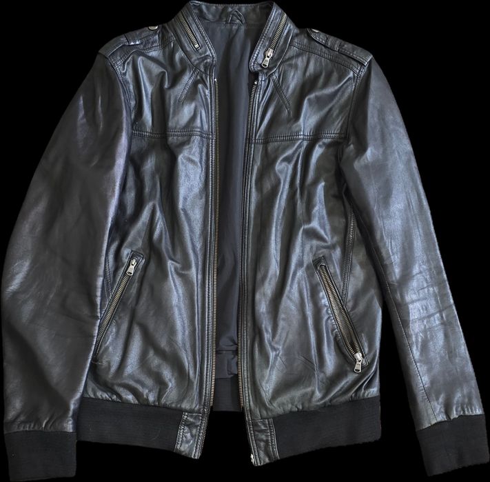 Кожаная куртка  .