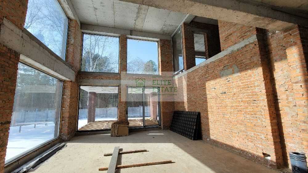 Продаж сучасного будинку 300 м² + 39 соток в сосновому лісі