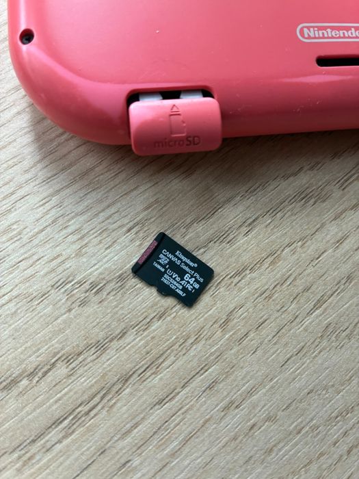 Nintendo Switch Lite + gra+ karta micro SD 64gb