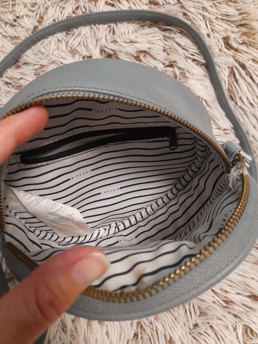 Кругла сумочка, шкірозамінник