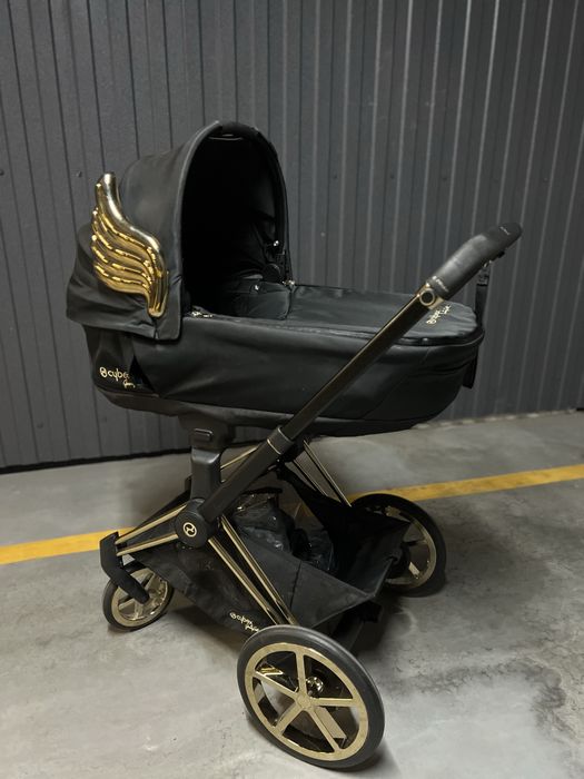 Cybex e-Priam wings by Jeremy Scott з електроприводом