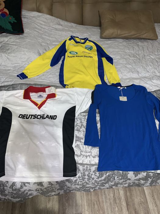 Футболки.            .