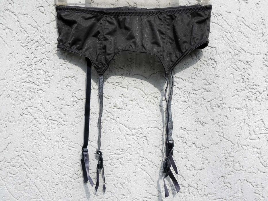 *Hennes & Mauritz* błyszczący srebrem roz 42-48