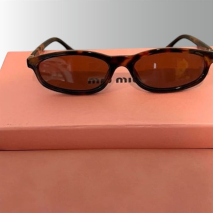 Oculos de sol miumiu