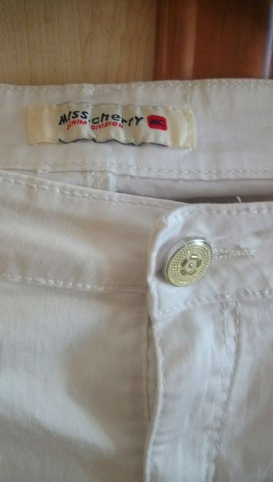 Białe spodnie XL