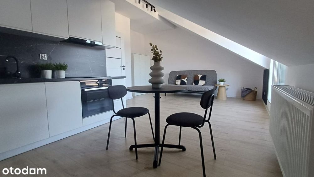 Kawalerka 30 m² + duży taras 17 m² + m. p. w garażu podziemnym - Widok 2