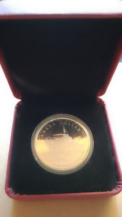 Продам монету серебро 1 доллар