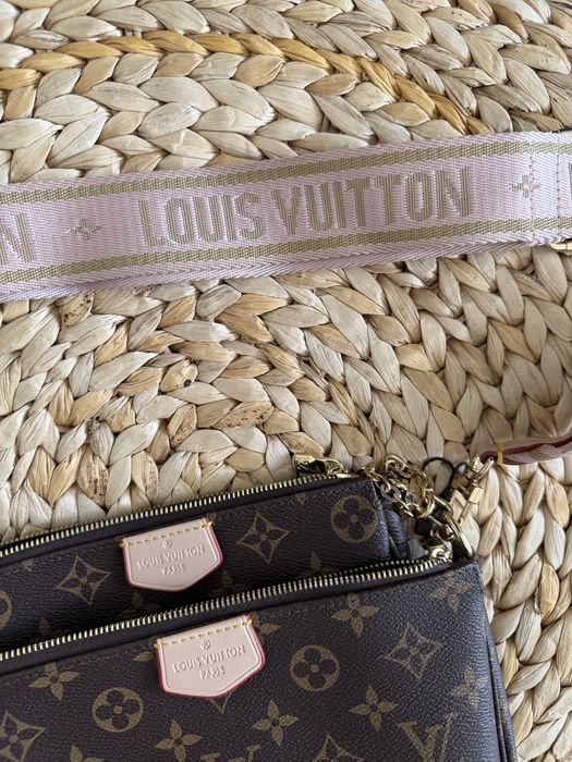 Mala Louis Vuitton com alça rosa