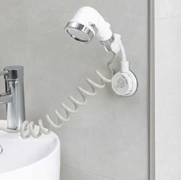 Регулируемый держатель (фиксатор) для душа на присоске.