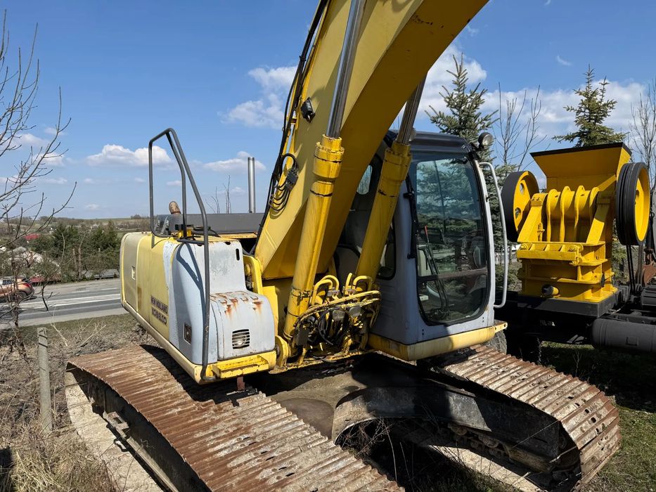 New Holland Kobelco E215  Koparka gąsienicowa New Holland E215 rok2005 (brutto za granice)