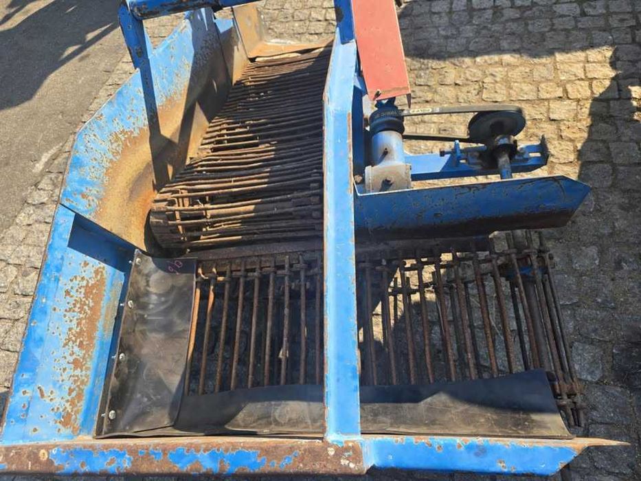 Arrancador de batata de tapete com descarga lateral - usado