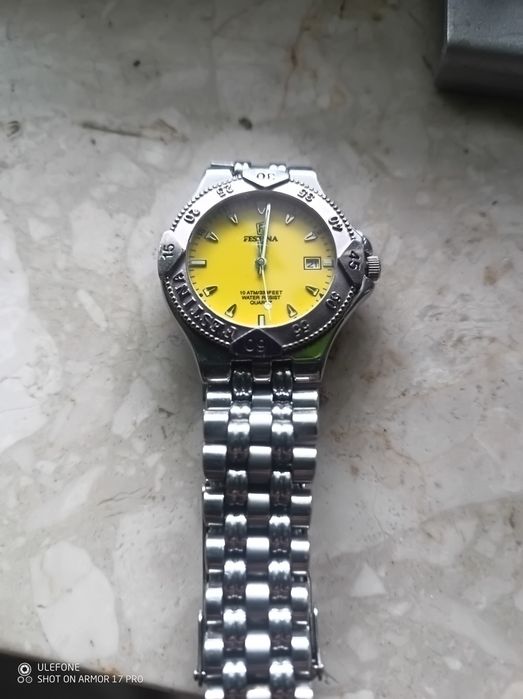 Festina żółta stalowa