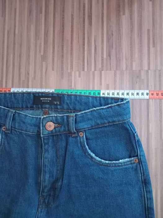 Spodnie jeansowe Reserved 38