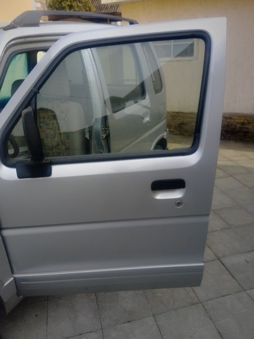 Двері автомобільні Сузукі вагон