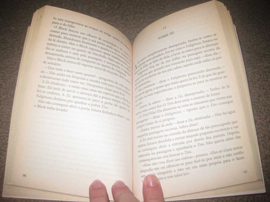 Livro "Os Cinco no Monte dos Contrabandistas" de Enid Blyton