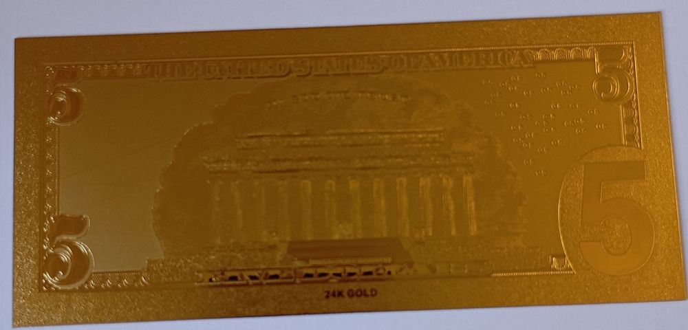 Coleção de notas de dólares revistidas a ouro