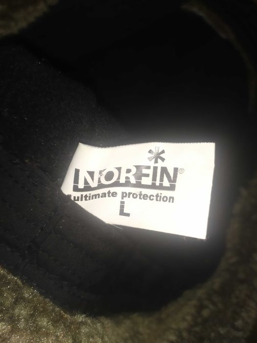 Кепка-ушанка Norfin, легкая, теплая, влагостойкая.