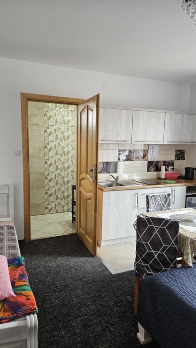 Pokoje i apartamenty z balkonami