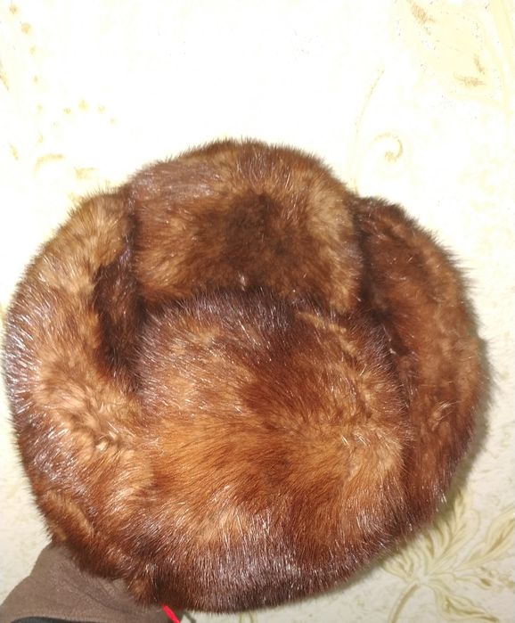 Норкові шапки нові