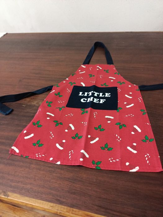 Avental de criança novo.