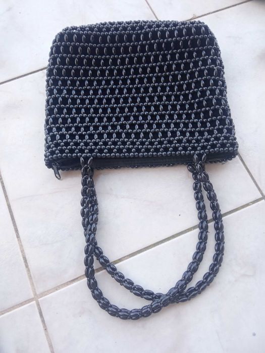 Bolsa preta mão