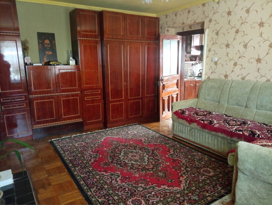 Продам часину будинка в центрі Зміїва
