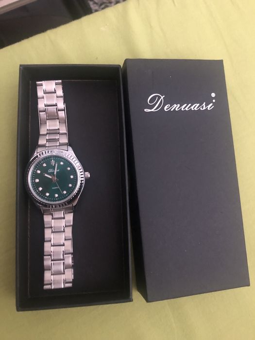 Relogio fundo verde Novo