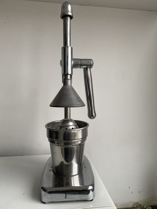 Espremedor de cotrinos vintage