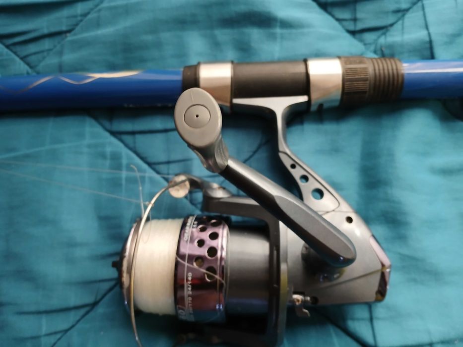 Cana de pesca + carreto + acessórios+ saco