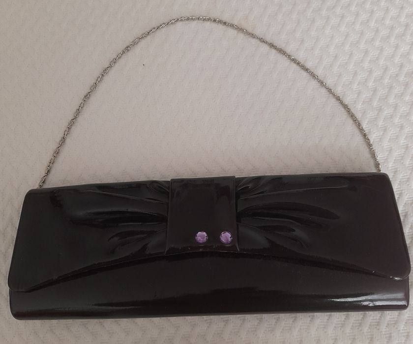 Pochetes prateada e roxa