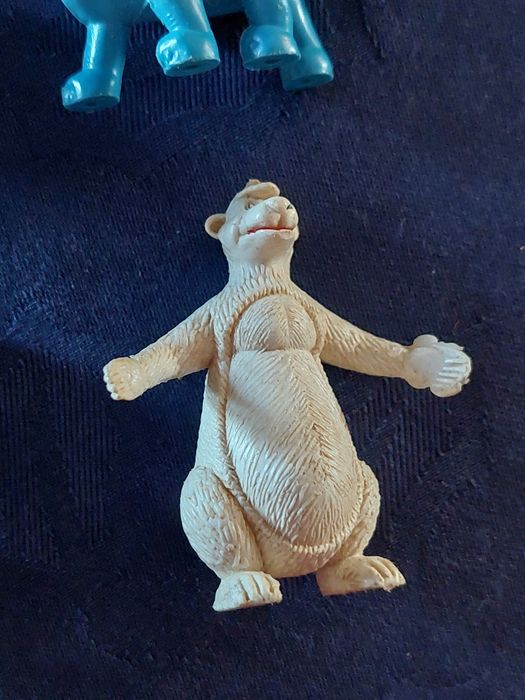 bonecos muito raros monocromaticos Mogli brinde