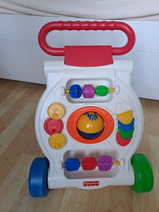 Pchacz do nauki chodzenia. Marka Fisher Price.