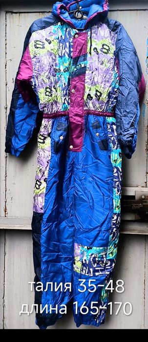 Комбинезоны лыжные женские