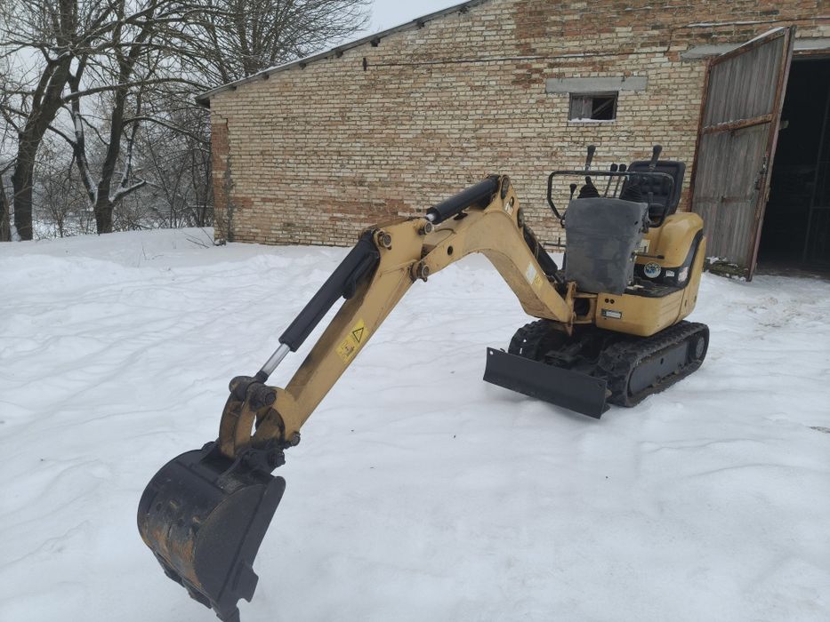 Мініекскаватор Caterpillar 008cr