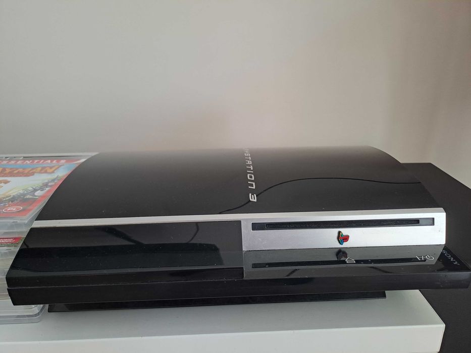 PlayStation 3 PS3 + 2 pady + SingStar + gry