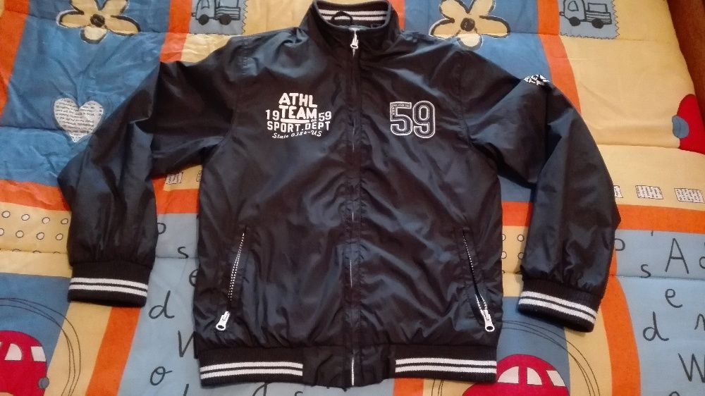 quispo/casaco corta vento 9/10 anos