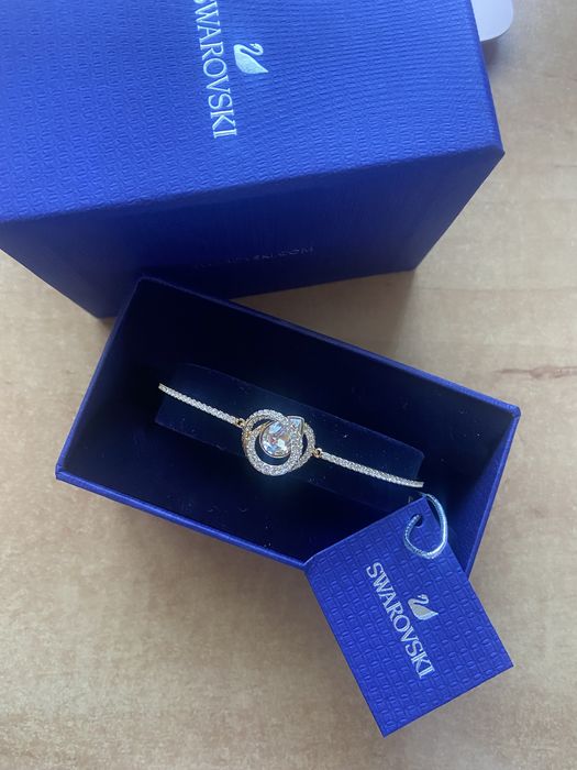 Bransoletka typu bangle w odcieniu złota NOWA Swarovski
