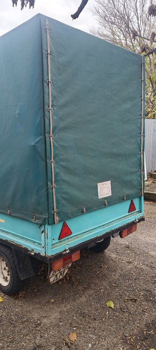 Прицеп двухосный тентованый