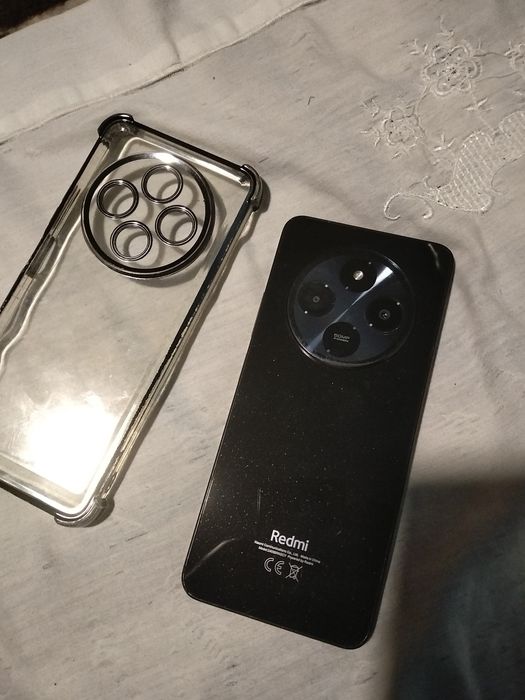 telemóvel é um Xiaomi Redmi 14C na cor Midnight Black.