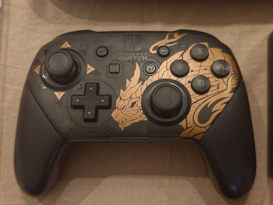 Nintendo Switch OLED Neon Czerwony/Niebieski + Pro Controller + 2 gry