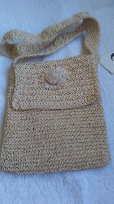 Vendo blusa e bolsa nova