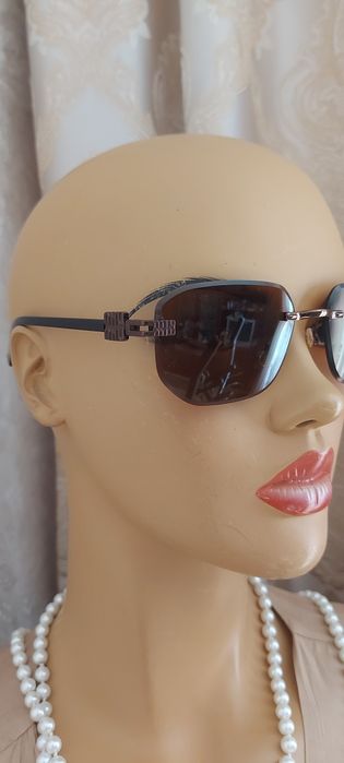 Сонцезахисні окуляри  miu miu