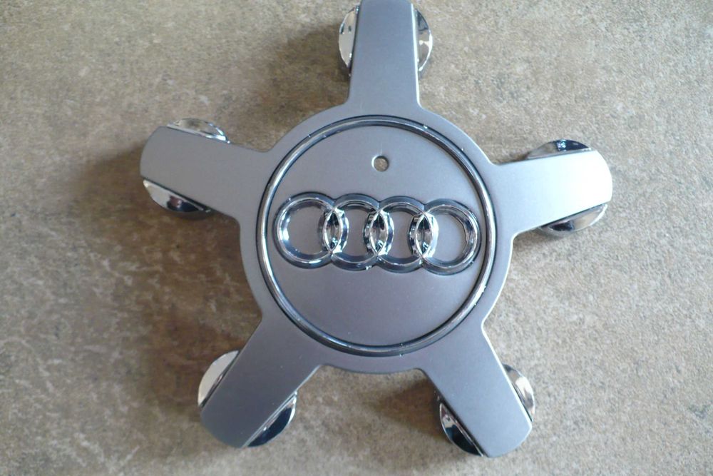 Pająki Dekielki Audi Oryginalne NOWE Komplet