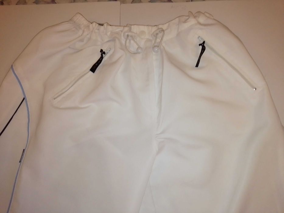 Spodnie białe szerokie nogawki