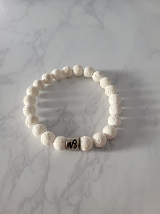 Pulseira branca esoterica