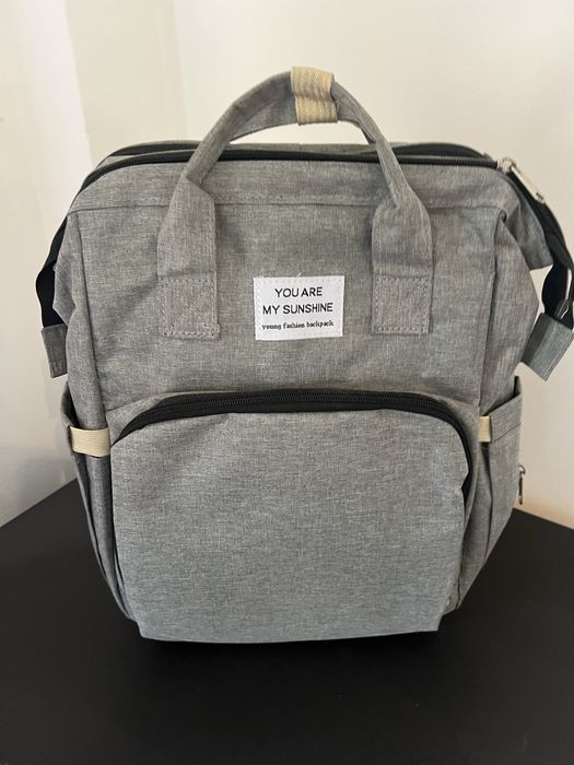 Mochila de bebe com muda fralda/cama