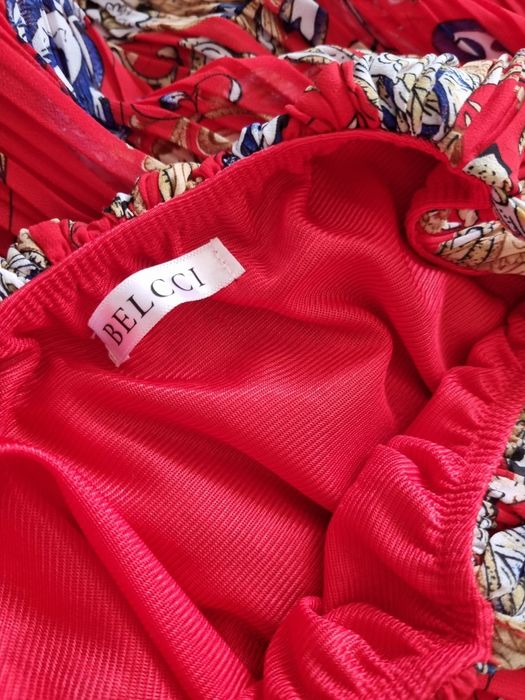 Kombinezon na cienkich, regulowanych ramiączkach