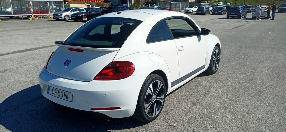 VW Beetle coupe TSI troca retoma